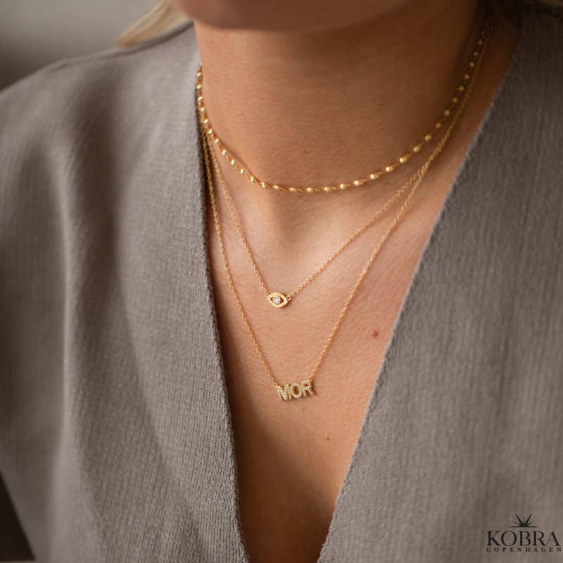 "MOR" guld halsk�de med sten