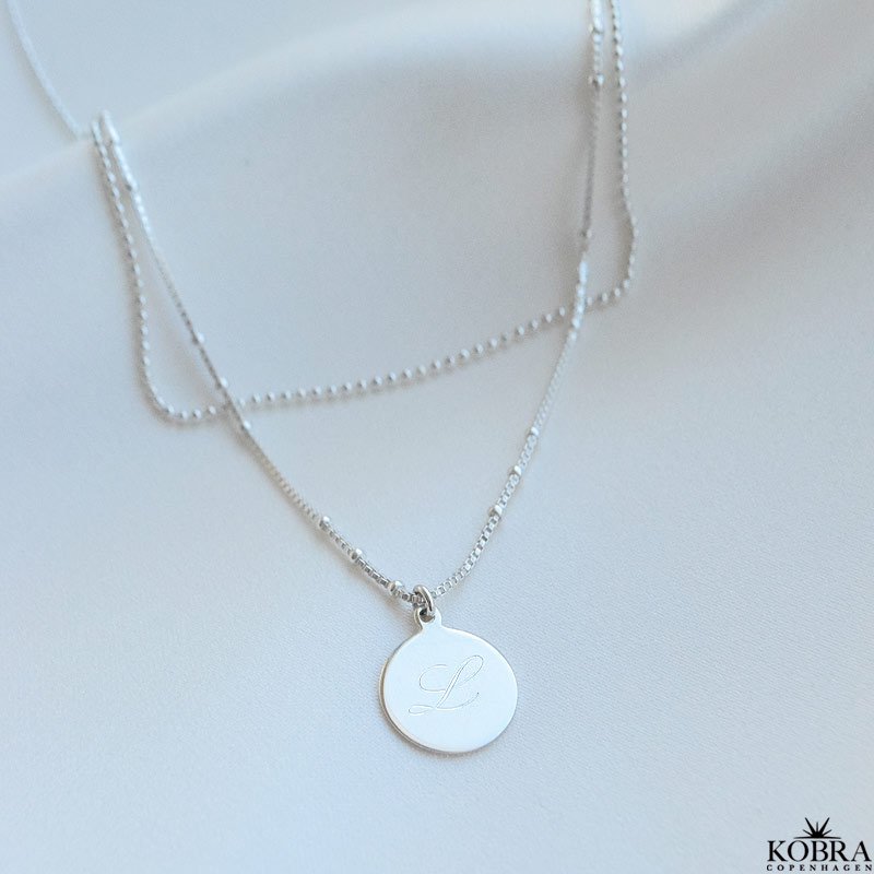 "Eternity" 2 in 1 necklace in silver with small amulet