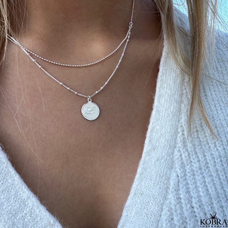 "Eternity" 2 in 1 necklace in silver with small amulet