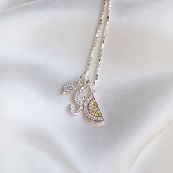 "Alias" silver letter with white stones (charm)