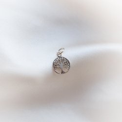Silver charm with Tree of Life amulet