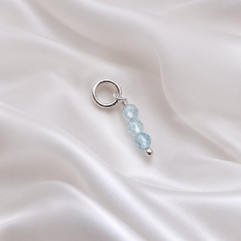 "Aquamarine" silver charm with blue aquamarines
