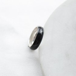"Zora" with a simple black design