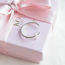 "Cleo" silver toe ring with a minimalist cross design