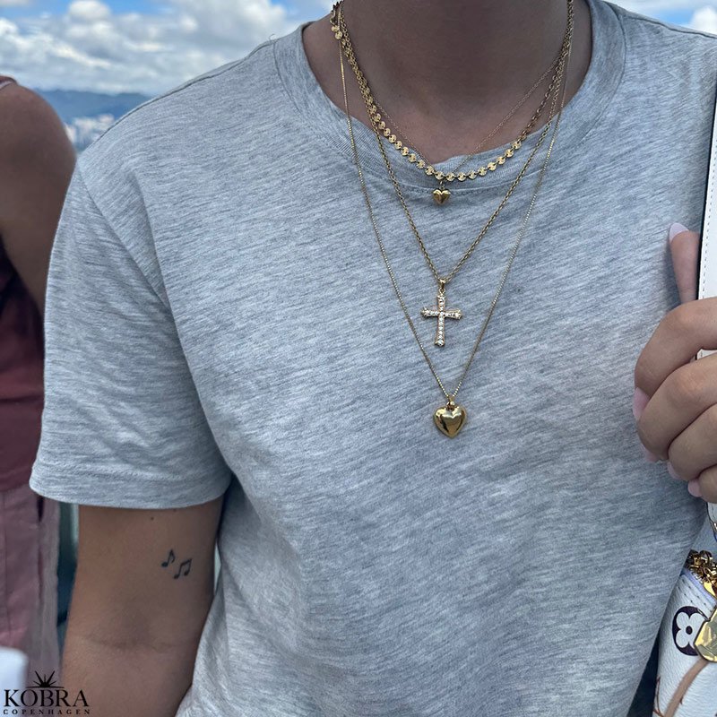 "SOL" gold necklace with small suns