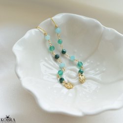 "September" 18 karat forgyldte smukke perle reringe