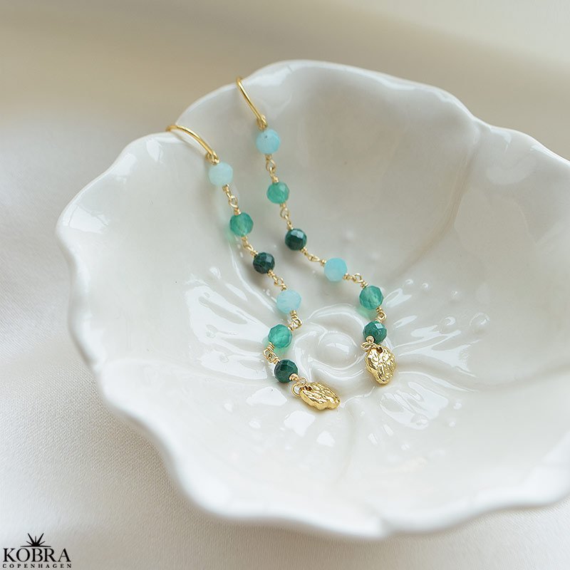 "September" 18 karat forgyldte smukke perle reringe