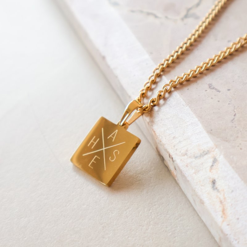"Trend" necklace in 18K gold-plated stainless steel with cross engraving