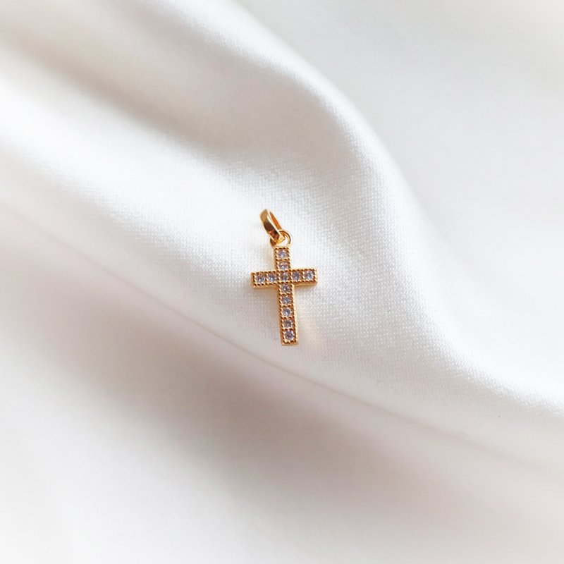 Charm - small gold cross in 18 carat gold plated with white gems