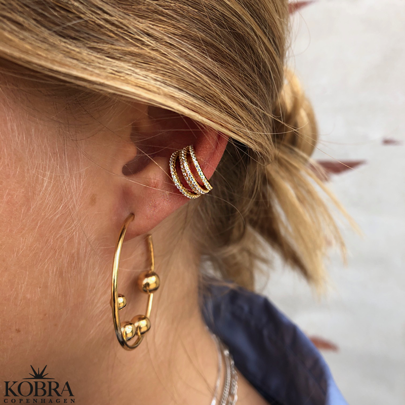 "Shine" stor earcuff i guld med hvide sten