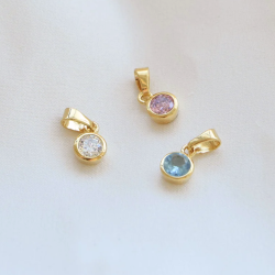Birthstone charm in gold