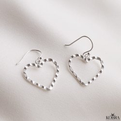 "Adore You" heart earrings in silver with a beaten surface