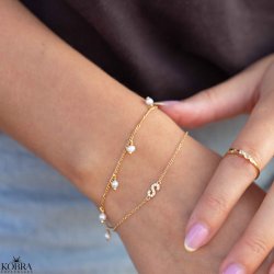 "Balance" gold bracelet with genuine freshwater pearls