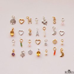 Charm i guld med Livets Tr amulet