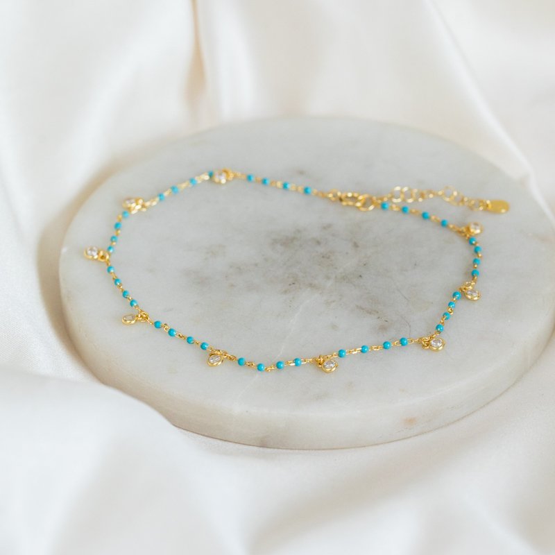 "Blue" gold-plated ankle chain with blue / turquoise pearls and white stones