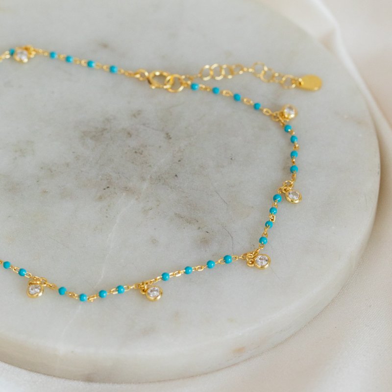 "Blue" gold-plated ankle chain with blue / turquoise pearls and white stones