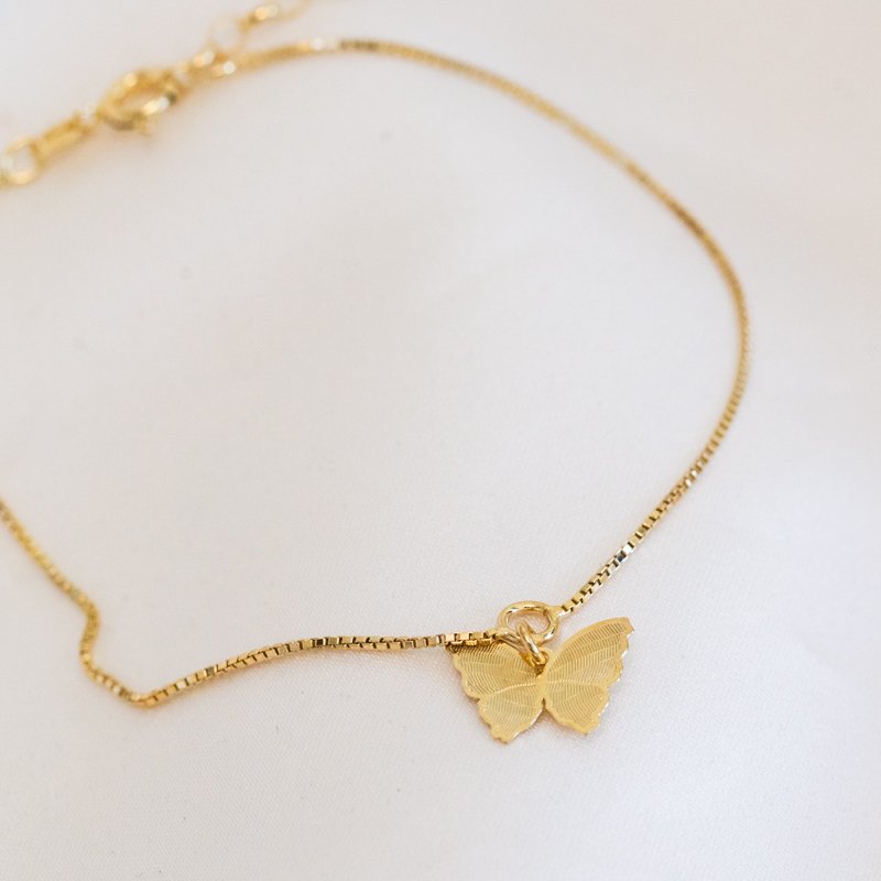 "Nanna" guld sommerfugl ankelk�de