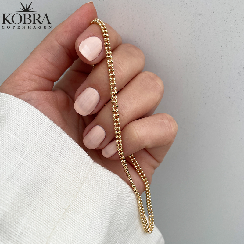 "Smilla" ankelkde med dobbelt guldkugler