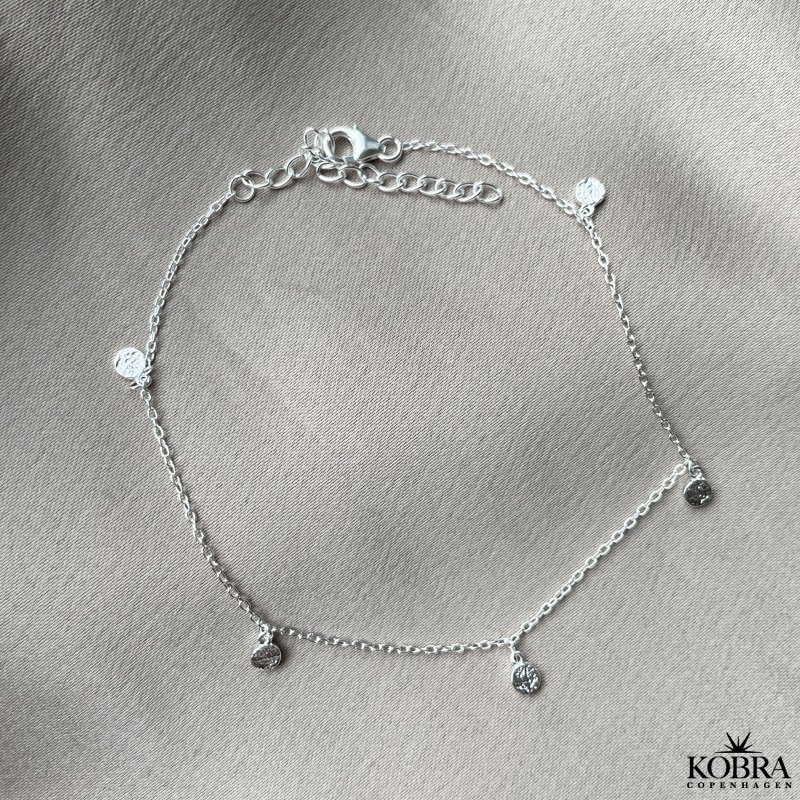 "Gemma" slv ankelkde med hammerslet amuletter