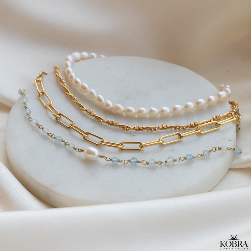 "Sally" twisted ankle chain in plated gold