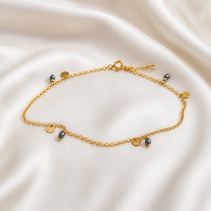 "Pittioni" gold ankle chain with blue freshwater pearls and small amulets