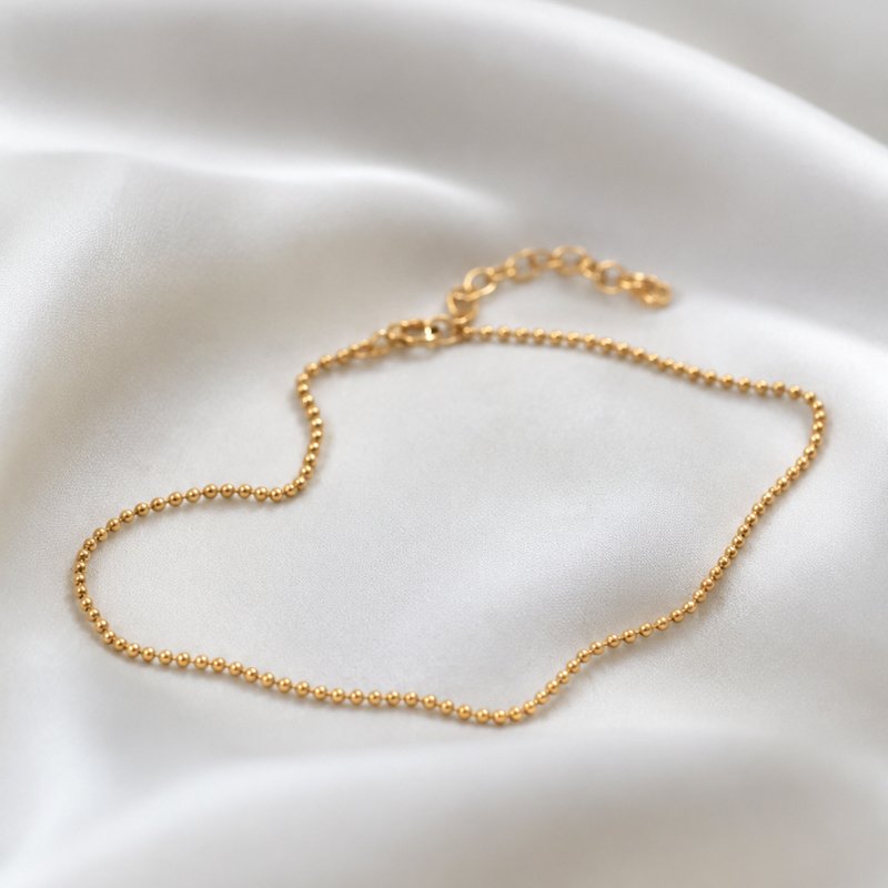 "Mellow" ankle chain with gold balls