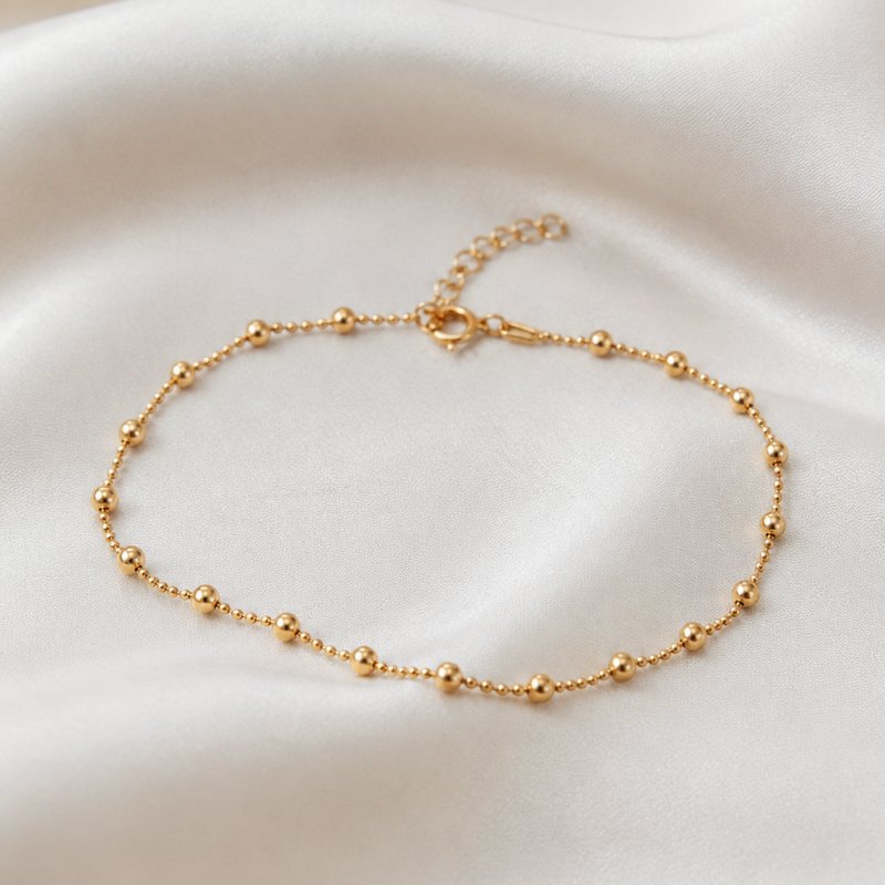"Ellie" gold ankle chain with gold balls