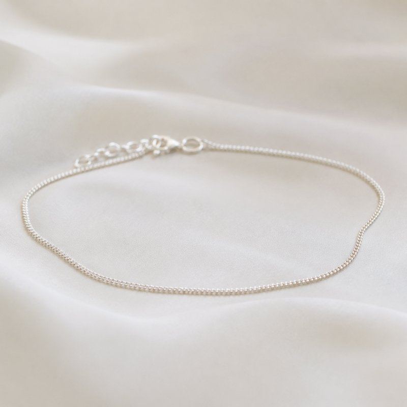 "Clinton" ankle chain in silver 1 mm. 