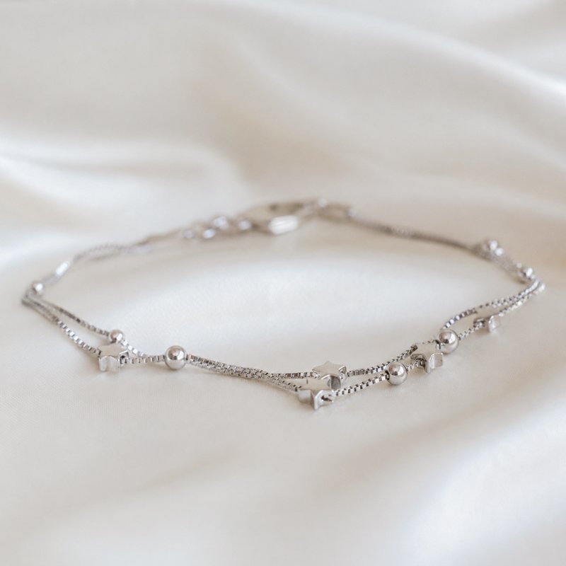 "Sulaima" silver double ankle chain with stars