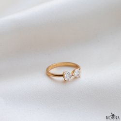 "Annie" gold ring with bow and stone