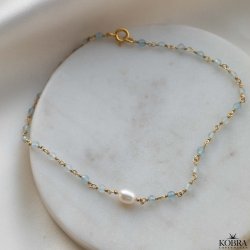 "Ellish" ankelkde i guld med bl aquamariner og perle