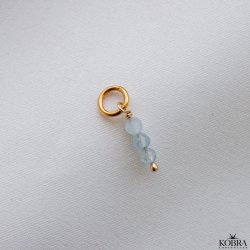 "Aquamarine" gold charm with blue aquamarines