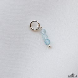 "Aquamarine" silver charm with blue aquamarines