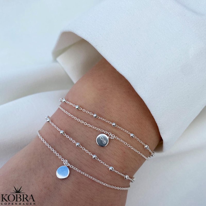 "Ellie" 2i1 silver bracelet with small amulet