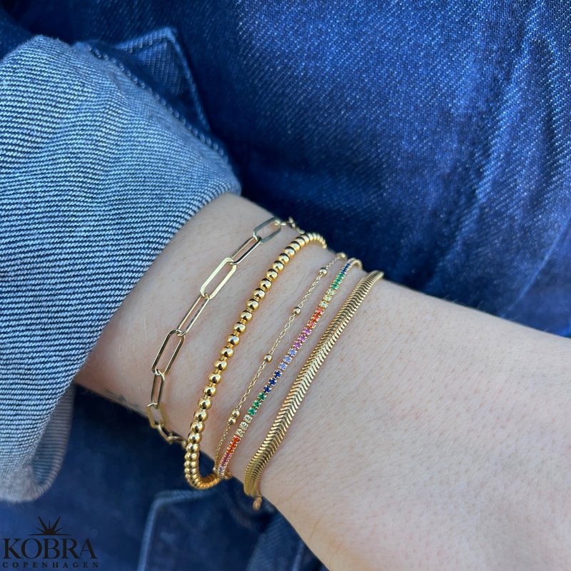 "Spring" armbnd med multifarvet sten i forgyldt