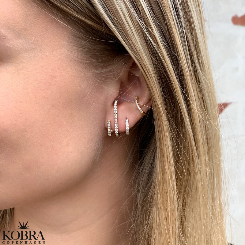 "Avery" gold earrings with white stones