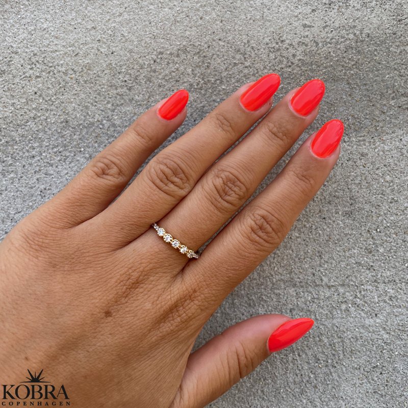 "Beatrice" gold ring with white stones