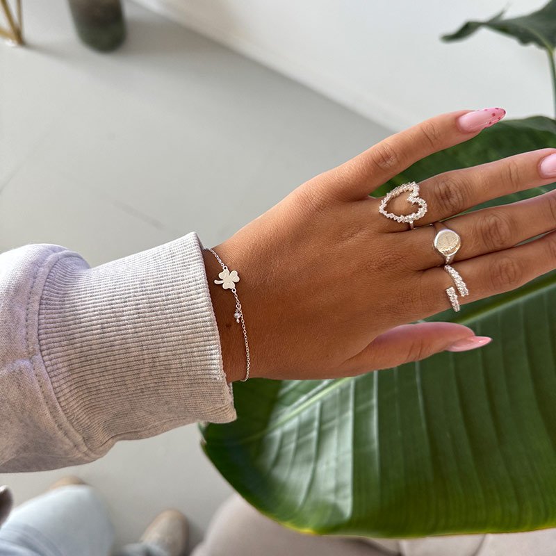 "Blazing Star" signet ring in sterling silver with your zodiac sign