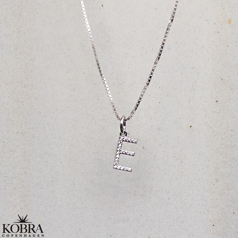 "Zoey" sterling silver letter with white stones