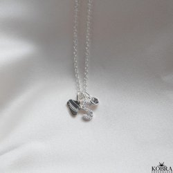 "Alias" silver letter with white stones (charm)