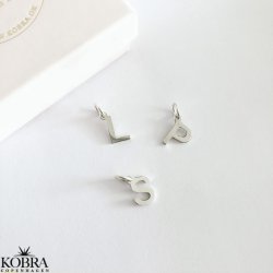 Small handmade letter in silver