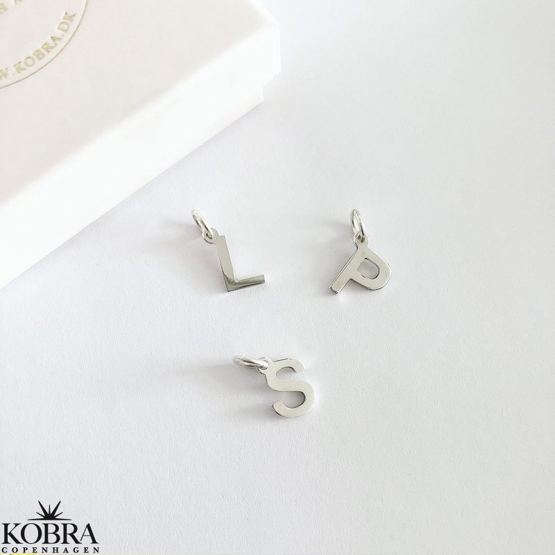 Small handmade letter in silver