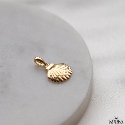 "Camina" musling charm i guld