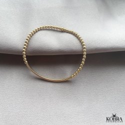 "Carly" Armbnd med bred plade og kraftige guldkugler