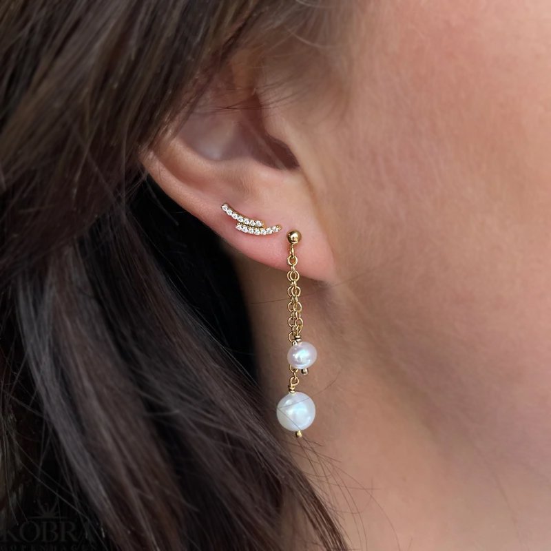 "Stormy" guld reringe med hvide zirkonia sten