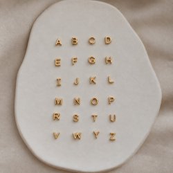 Chloe 18 carat plated gold silver letter pendant