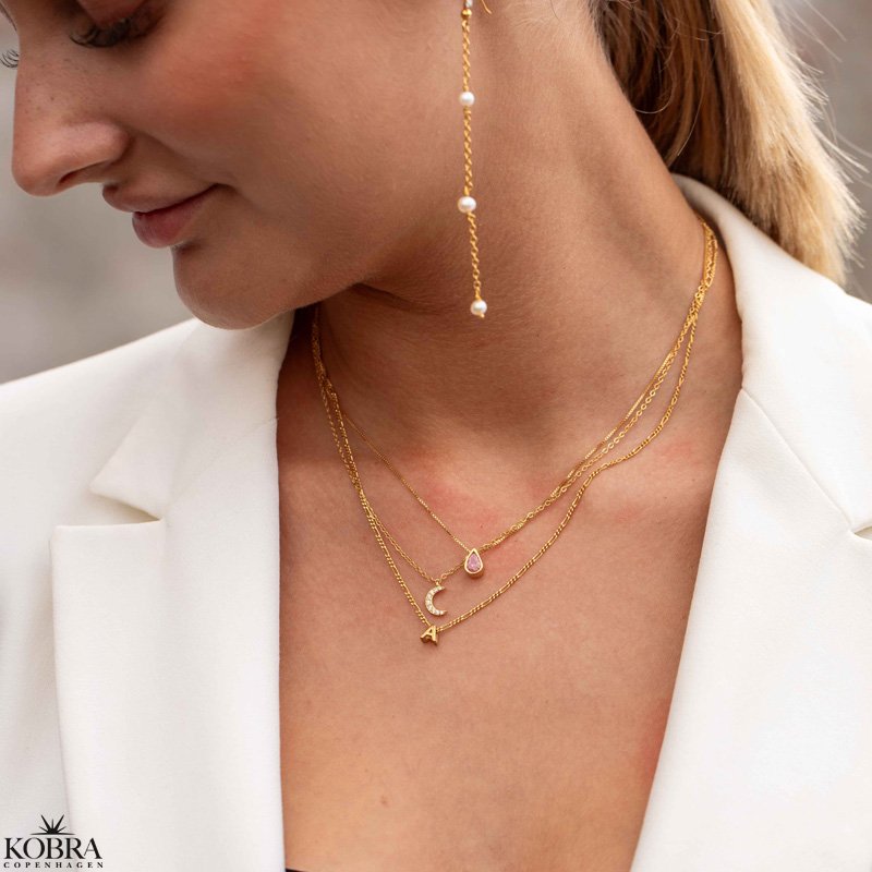 "Lunar" moon necklace with stones in gold