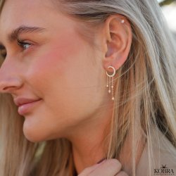 "Clarity" mne reringe i guld med sm stjerner 