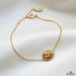 "Dazzling" guld armbnd med sten og gravering