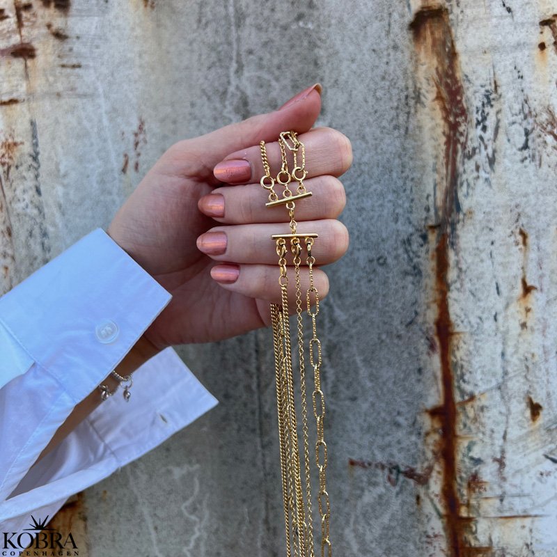 "Detangler" Lås til 3 halskæder i guld